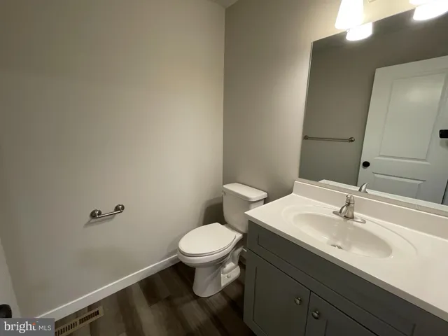 a bathroom with a sink and a toilet
