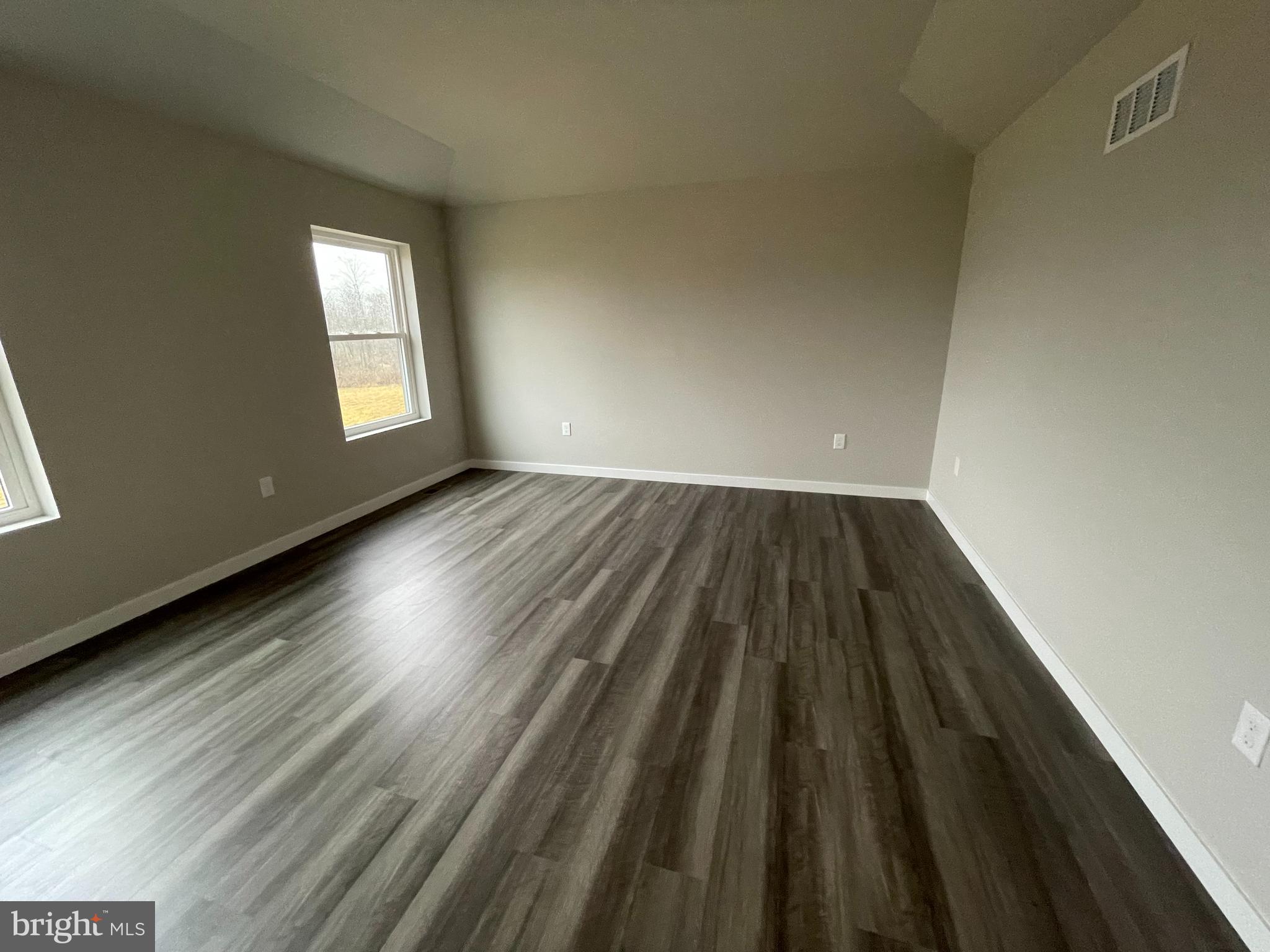 6173 Rizzuto Way Coopersburg, PA 18036 - Photo 7 of 21 a view of wooden floor in an empty room