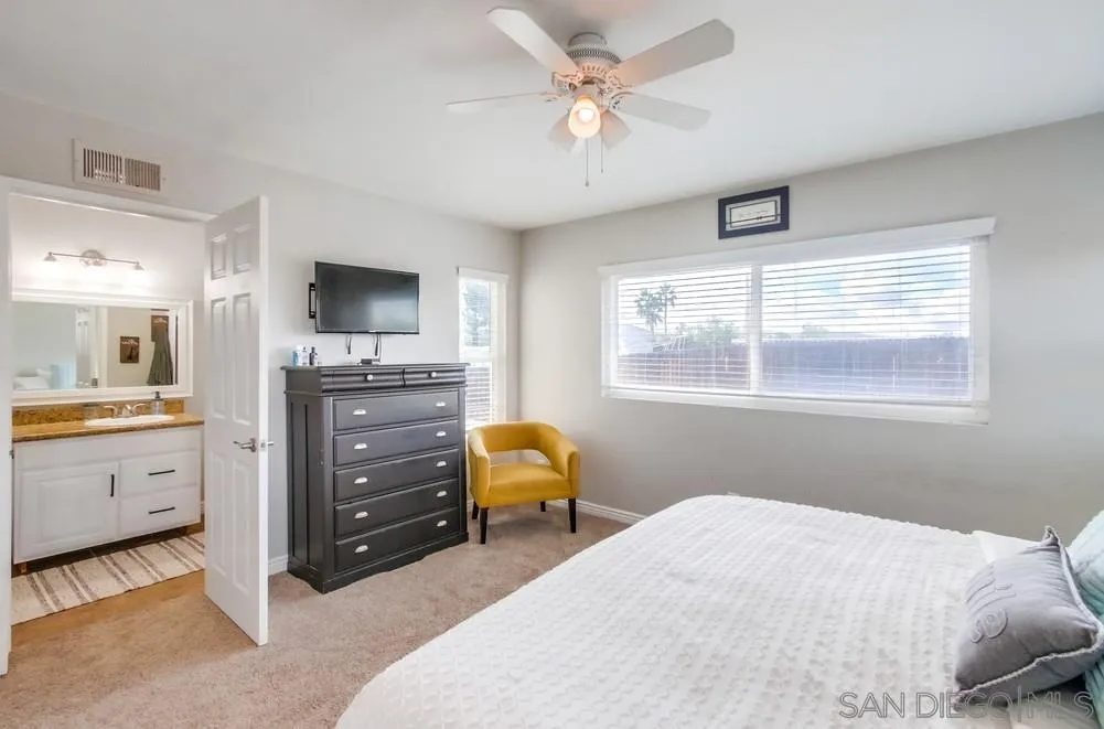 9118 Gotta Place Lakeside, CA 92040 - Photo 20 of 50 a bedroom with a bed and a window