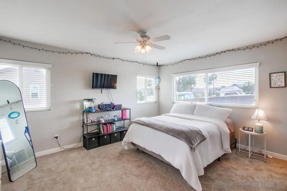 9118 Gotta Place Lakeside, CA 92040 - Photo 23 of 50 a bedroom with a bed and a window