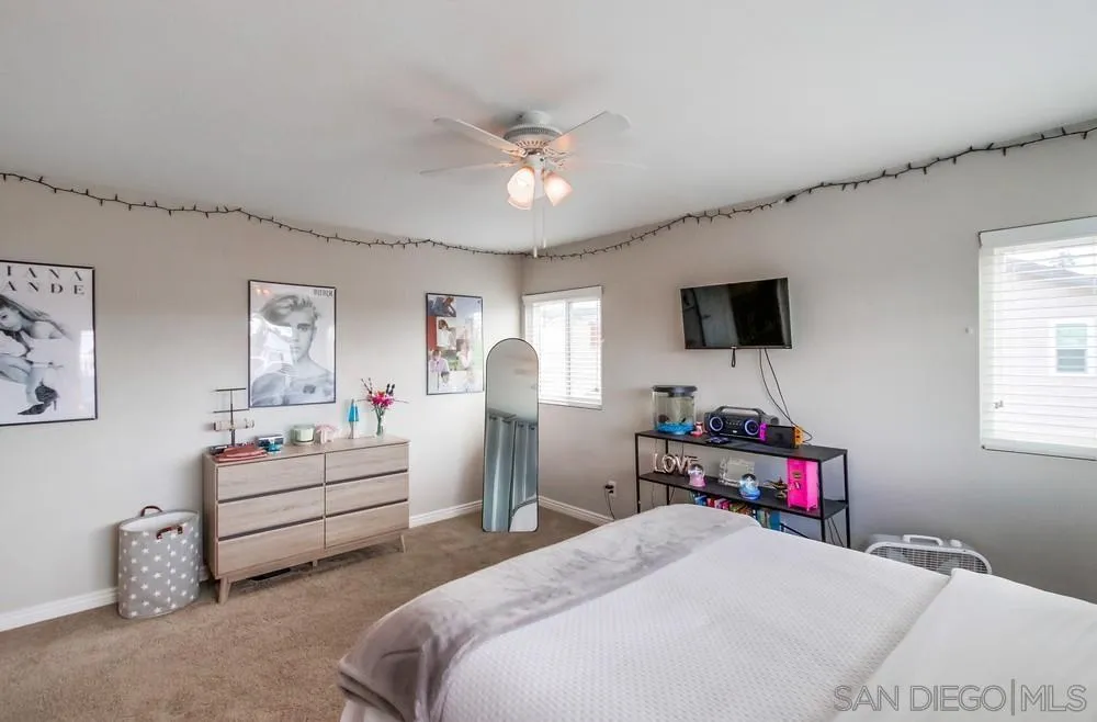 9118 Gotta Place Lakeside, CA 92040 - Photo 26 of 50 a bedroom with bed and window