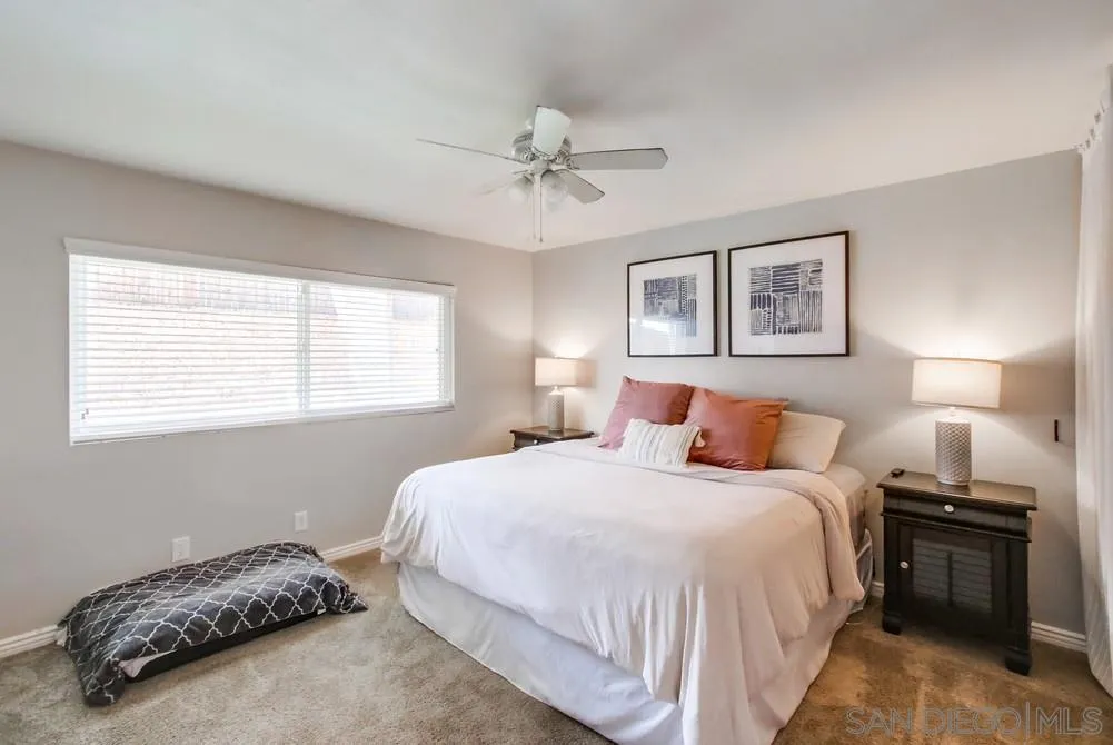 9118 Gotta Place Lakeside, CA 92040 - Photo 30 of 50 a bedroom with a bed and a window