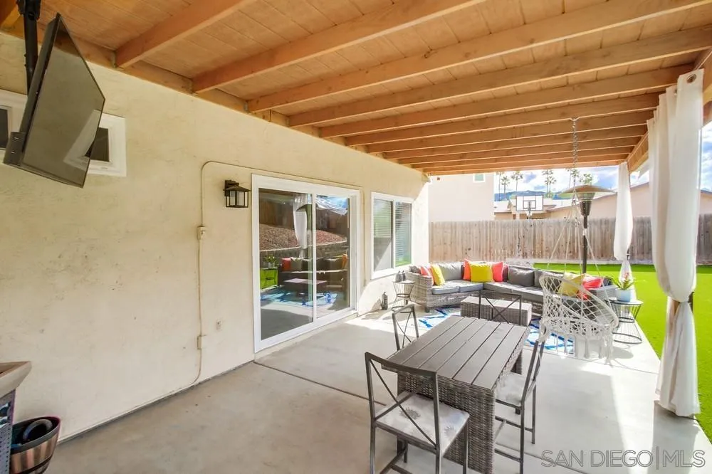 9118 Gotta Place Lakeside, CA 92040 - Photo 43 of 50 a outdoor space with patio the couches and a dining table with the view of the balcony