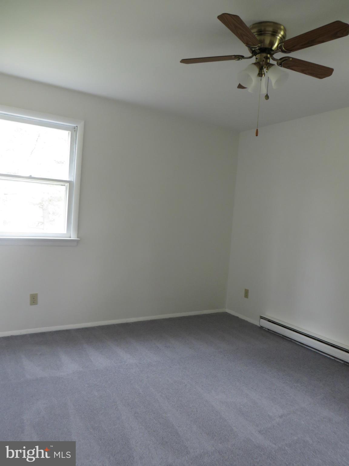 4101 Baptist Road Taneytown, MD 21787 - Photo 23 of 30 an empty room with a window and a fan