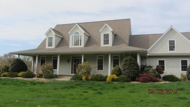 412 Hut Hill Road Bridgewater, CT 06752 - Photo 1 of 1 a view of a yard in front of house