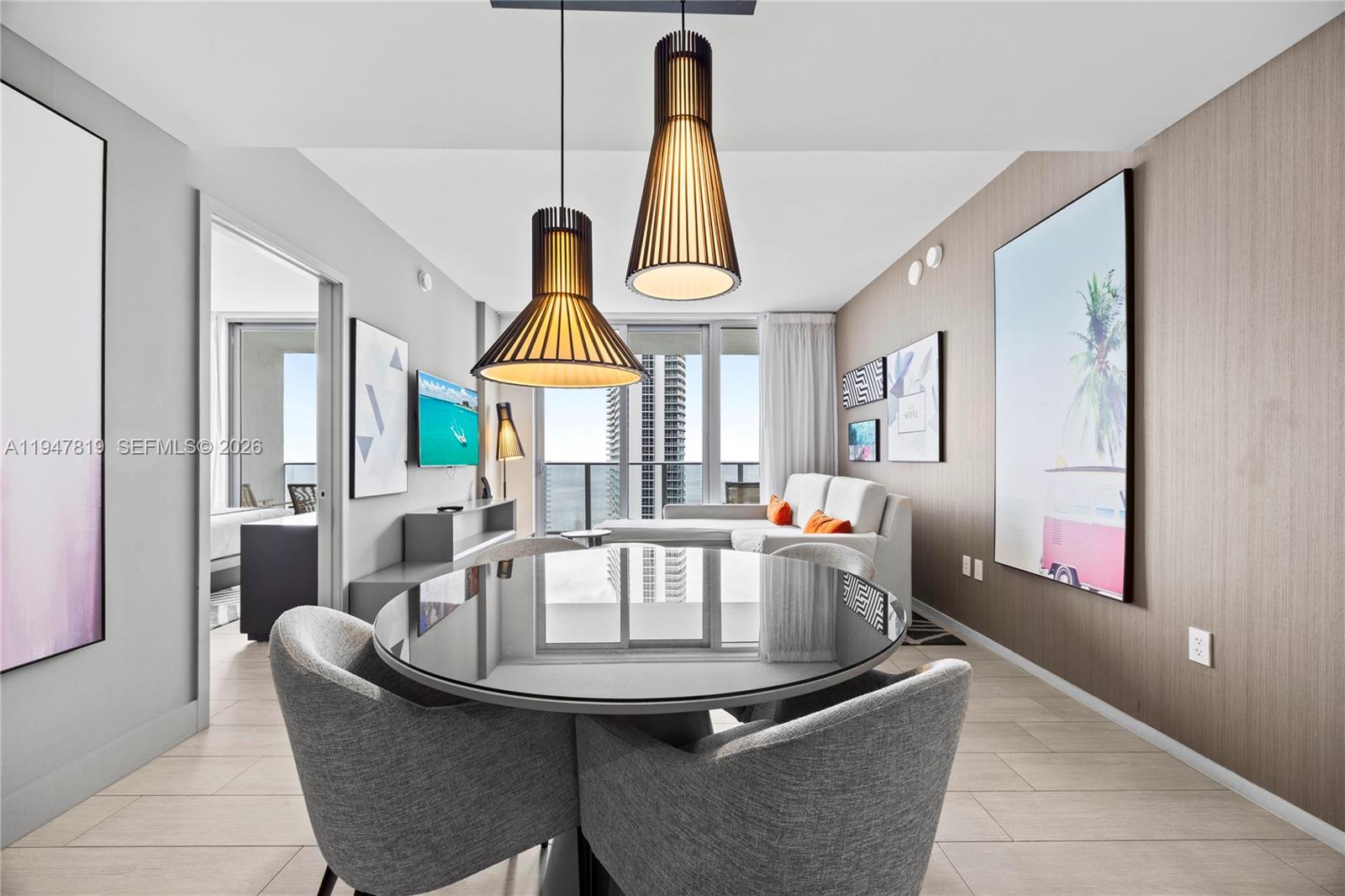 4010 South Ocean Drive, Unit R2307 Hollywood, FL 33019 - Photo 5 of 35 a kitchen with a table and chairs