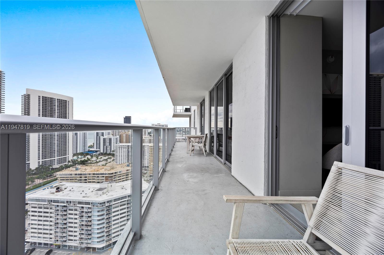 4010 South Ocean Drive, Unit R2307 Hollywood, FL 33019 - Photo 10 of 35 a view of a hallway with furniture and stairs