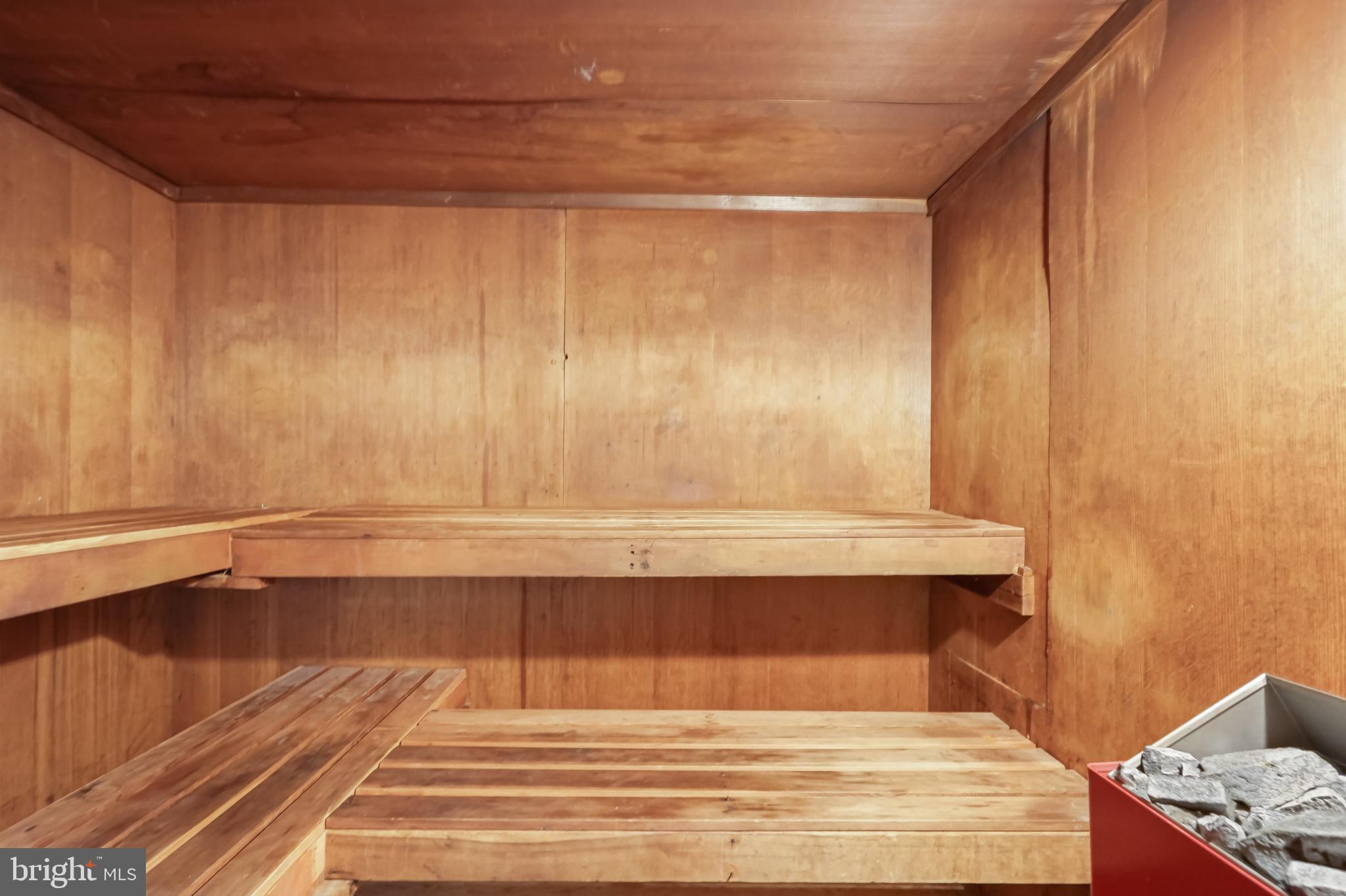 2801 New Mexico Avenue Northwest, Unit 204 Washington, DC 20007 - Photo 36 of 49 a view of wooden floor and chair in a room