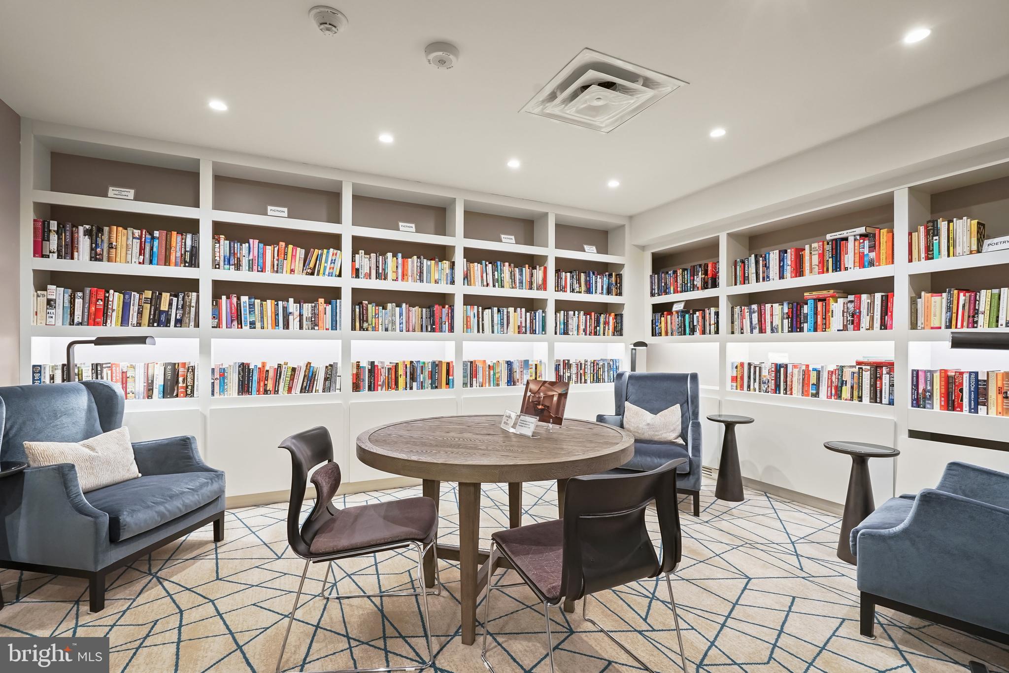 2801 New Mexico Avenue Northwest, Unit 204 Washington, DC 20007 - Photo 44 of 49 a view of a livingroom with furniture and a bookshelf
