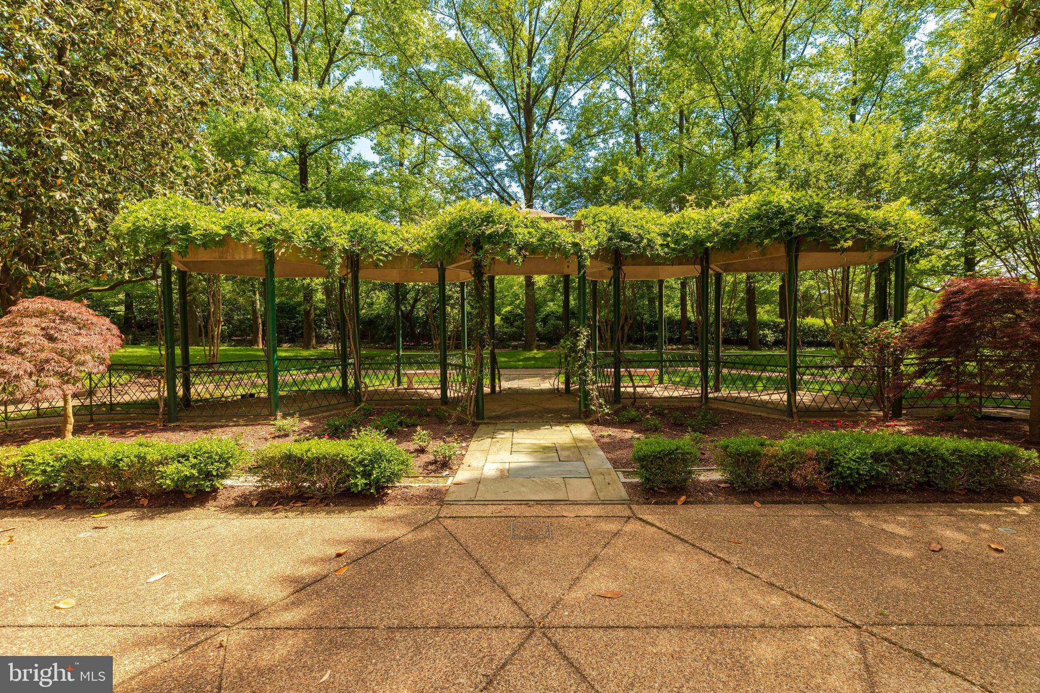 2801 New Mexico Avenue Northwest, Unit 204 Washington, DC 20007 - Photo 45 of 49 a view of a building with a garden