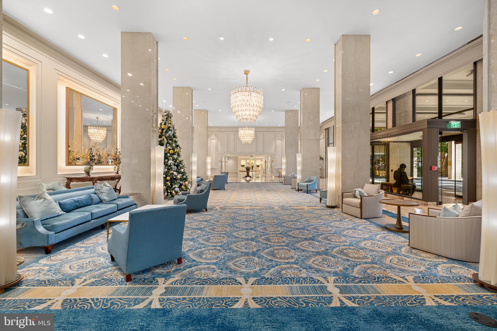 2801 New Mexico Avenue Northwest, Unit 204 Washington, DC 20007 - Photo 5 of 49 a living room with furniture a large window and wooden floor