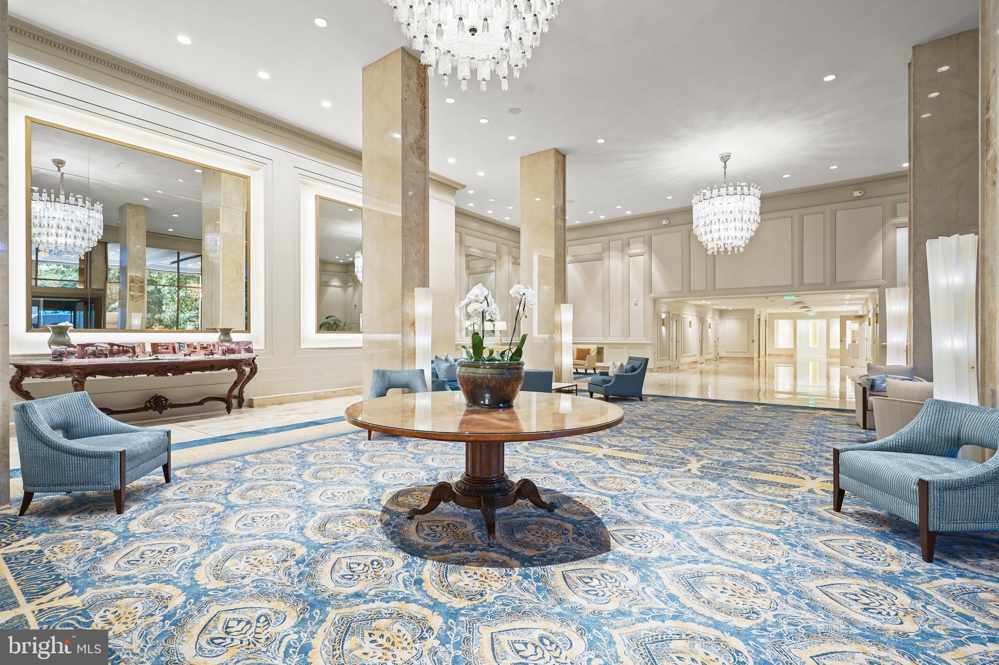2801 New Mexico Avenue Northwest, Unit 204 Washington, DC 20007 - Photo 7 of 49 a living room with furniture and a large window