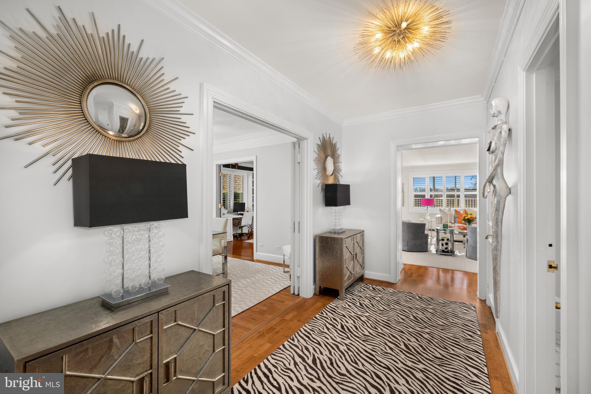 2801 New Mexico Avenue Northwest, Unit 204 Washington, DC 20007 - Photo 8 of 49 a living room with furniture and a flat screen tv