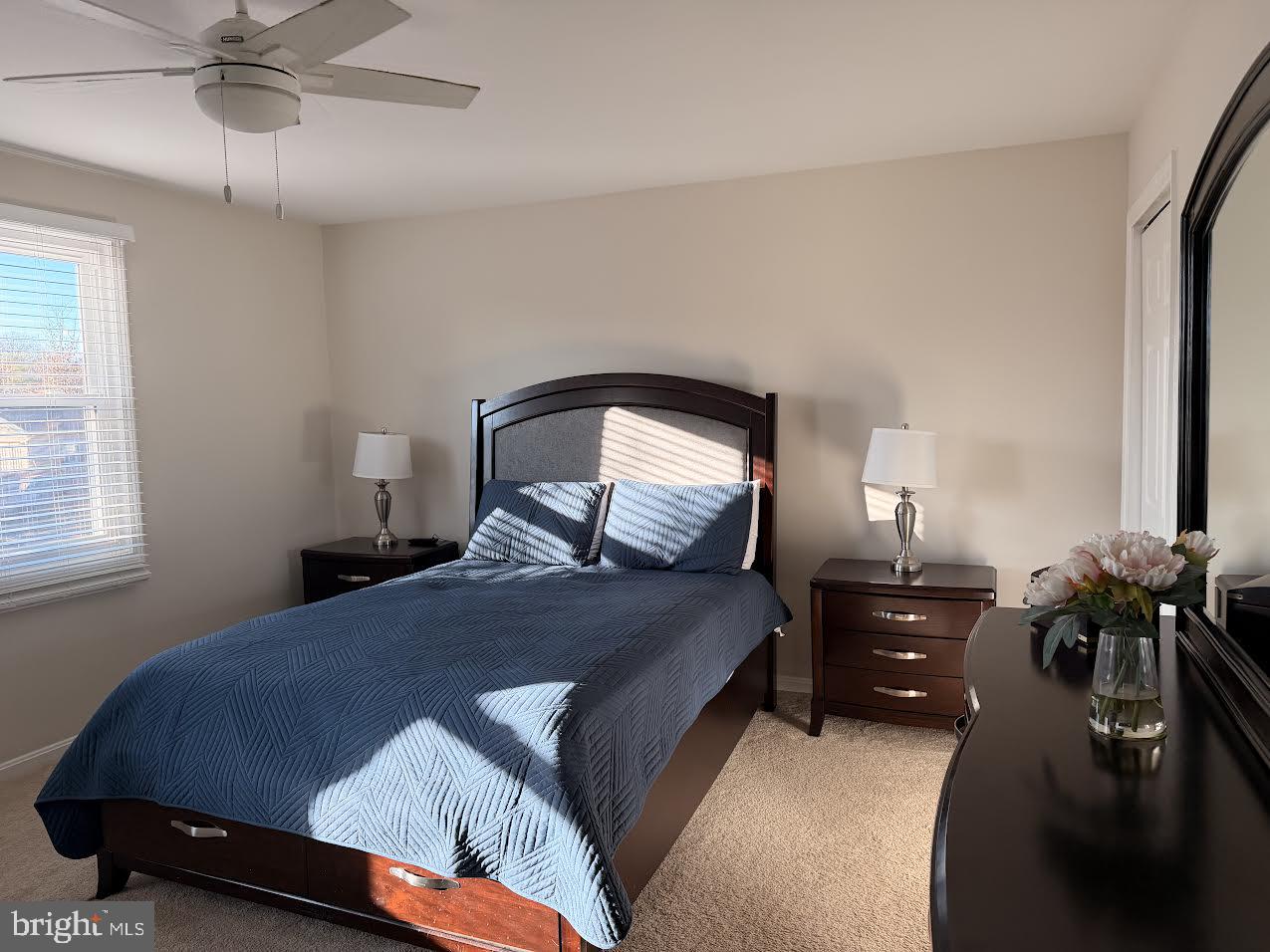 1705 Fairhill Drive Edgewater, MD 21037 - Photo 20 of 36 a bedroom with a bed window and couch