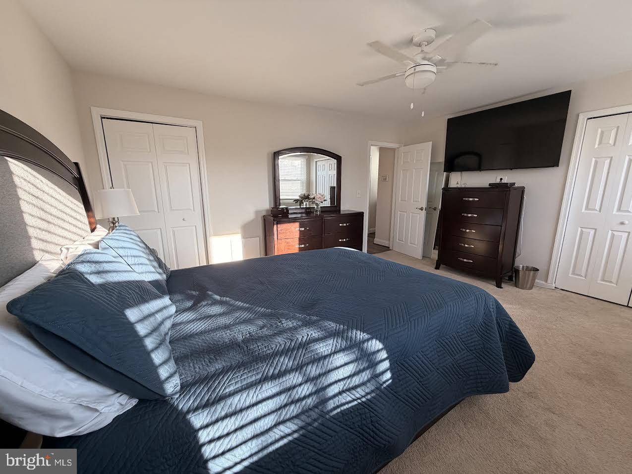 1705 Fairhill Drive Edgewater, MD 21037 - Photo 21 of 36 a bed sitting in a bedroom and a flat screen tv with dresser
