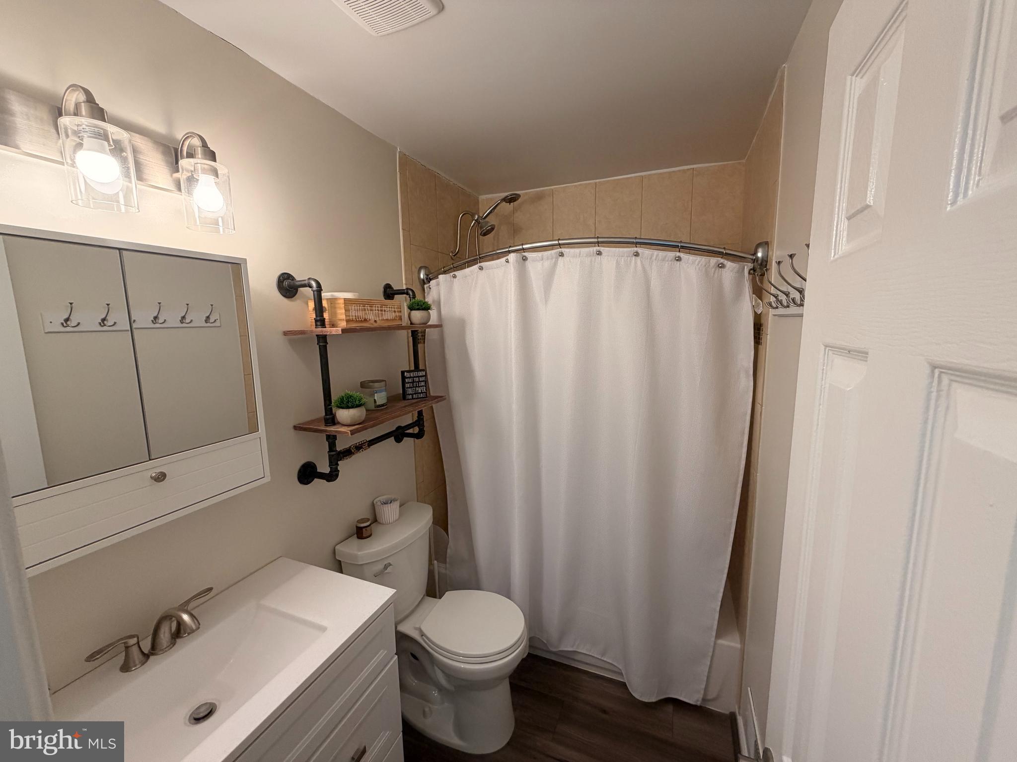 1705 Fairhill Drive Edgewater, MD 21037 - Photo 22 of 36 a bathroom with a sink toilet and shower