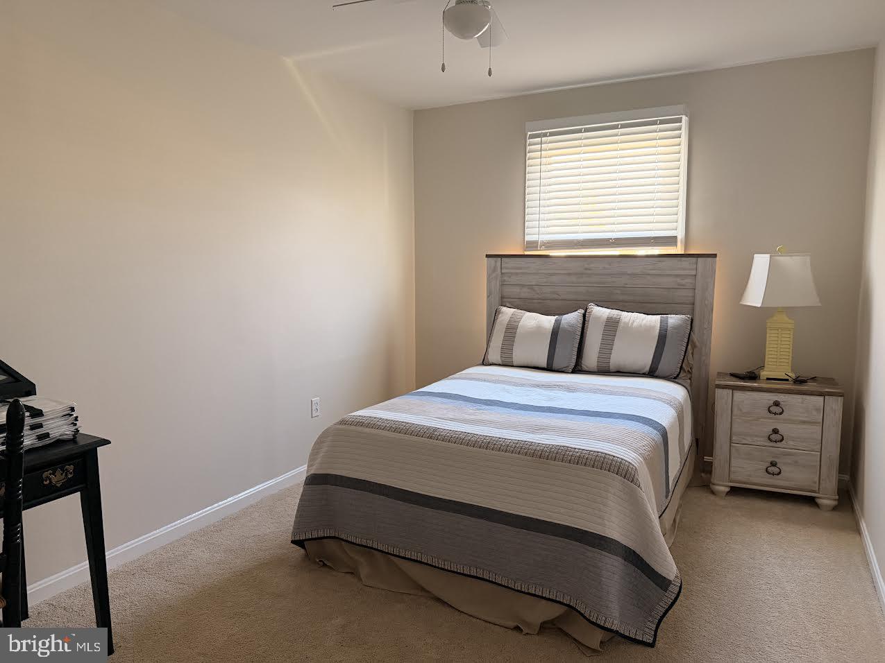 1705 Fairhill Drive Edgewater, MD 21037 - Photo 27 of 36 a bedroom with a bed and a window