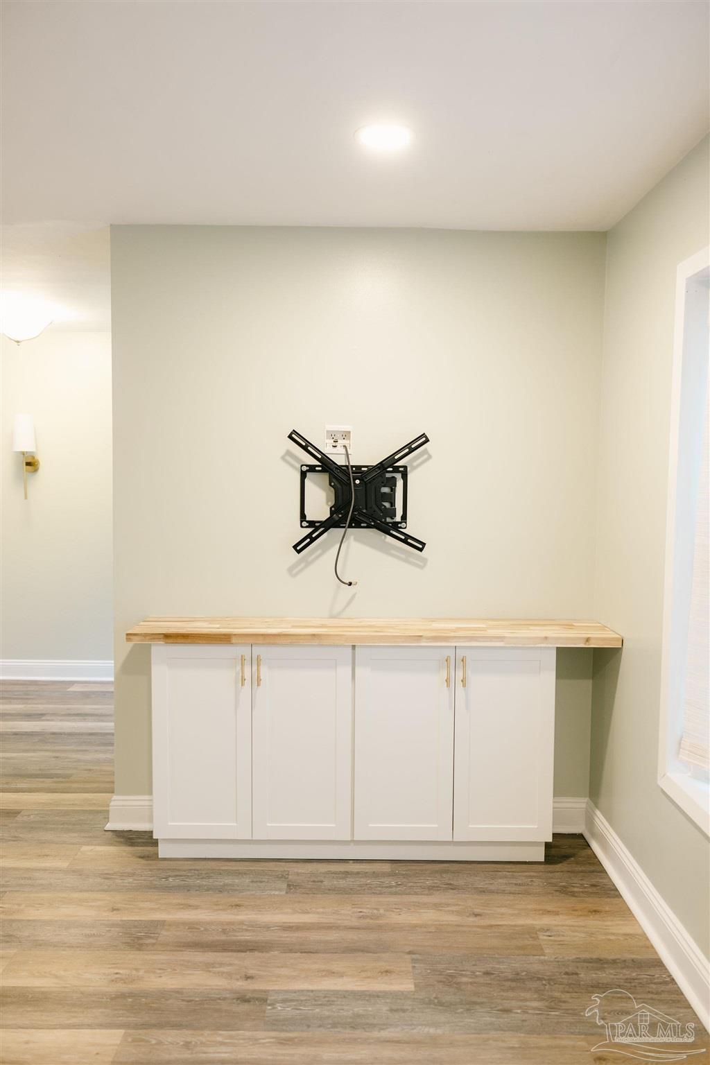 5580 Homewood Road Pensacola, FL 32504 - Photo 14 of 28 a view of a room with wooden floor