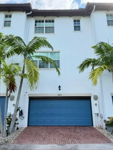 a view of a room with a large window