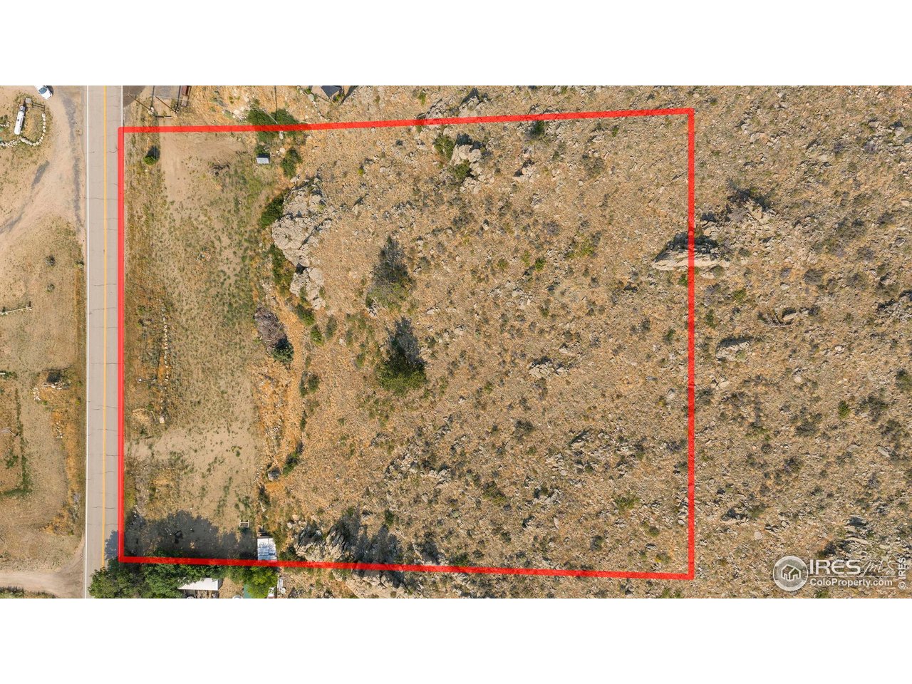 33032 Poudre Canyon Road Bellvue, CO 80512 - Photo 7 of 10 a black and white photo of a wall