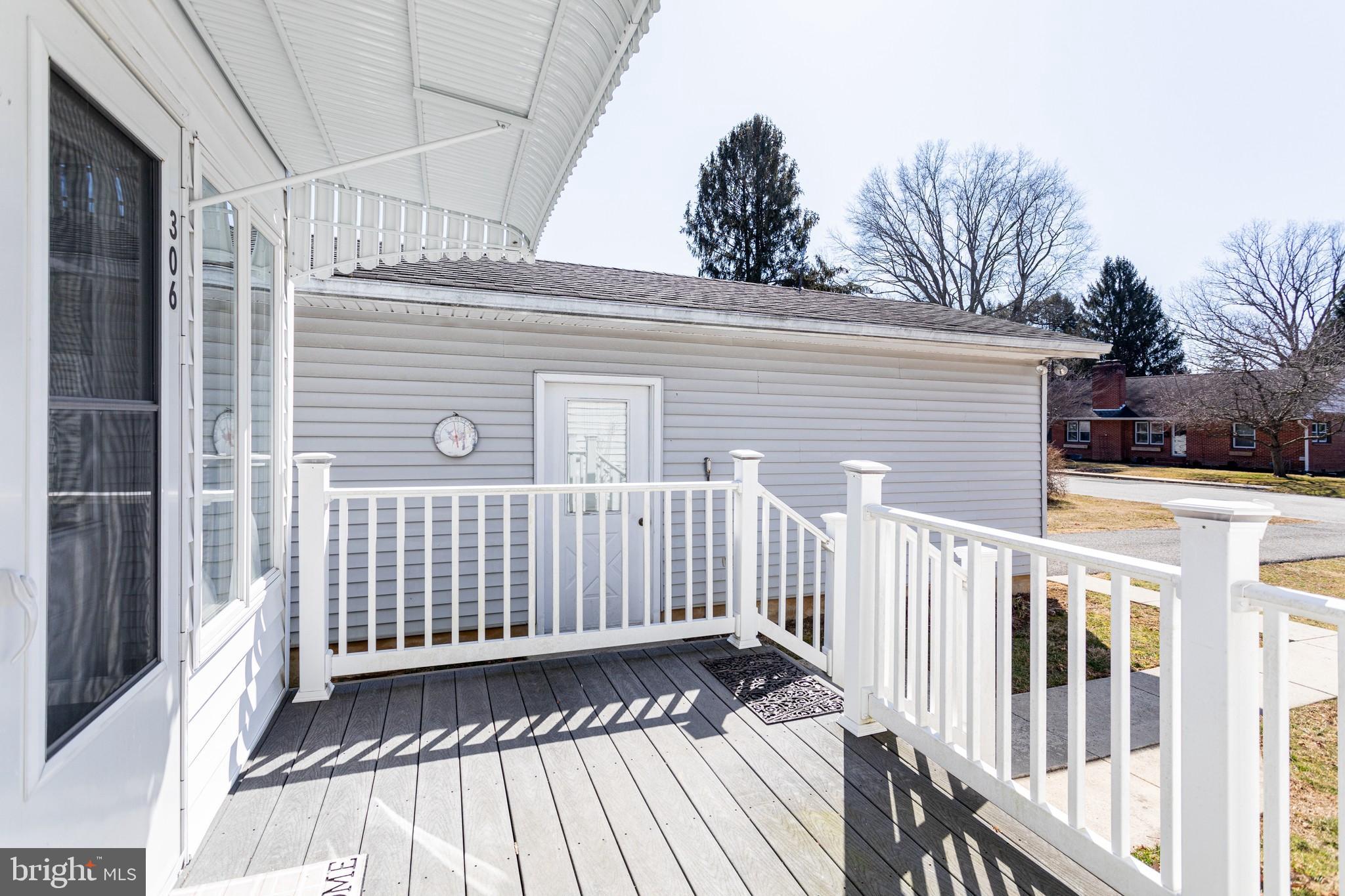 306 Hermitage Drive Elkton, MD 21921 - Photo 16 of 21 Side deck off of porch facing detached garage