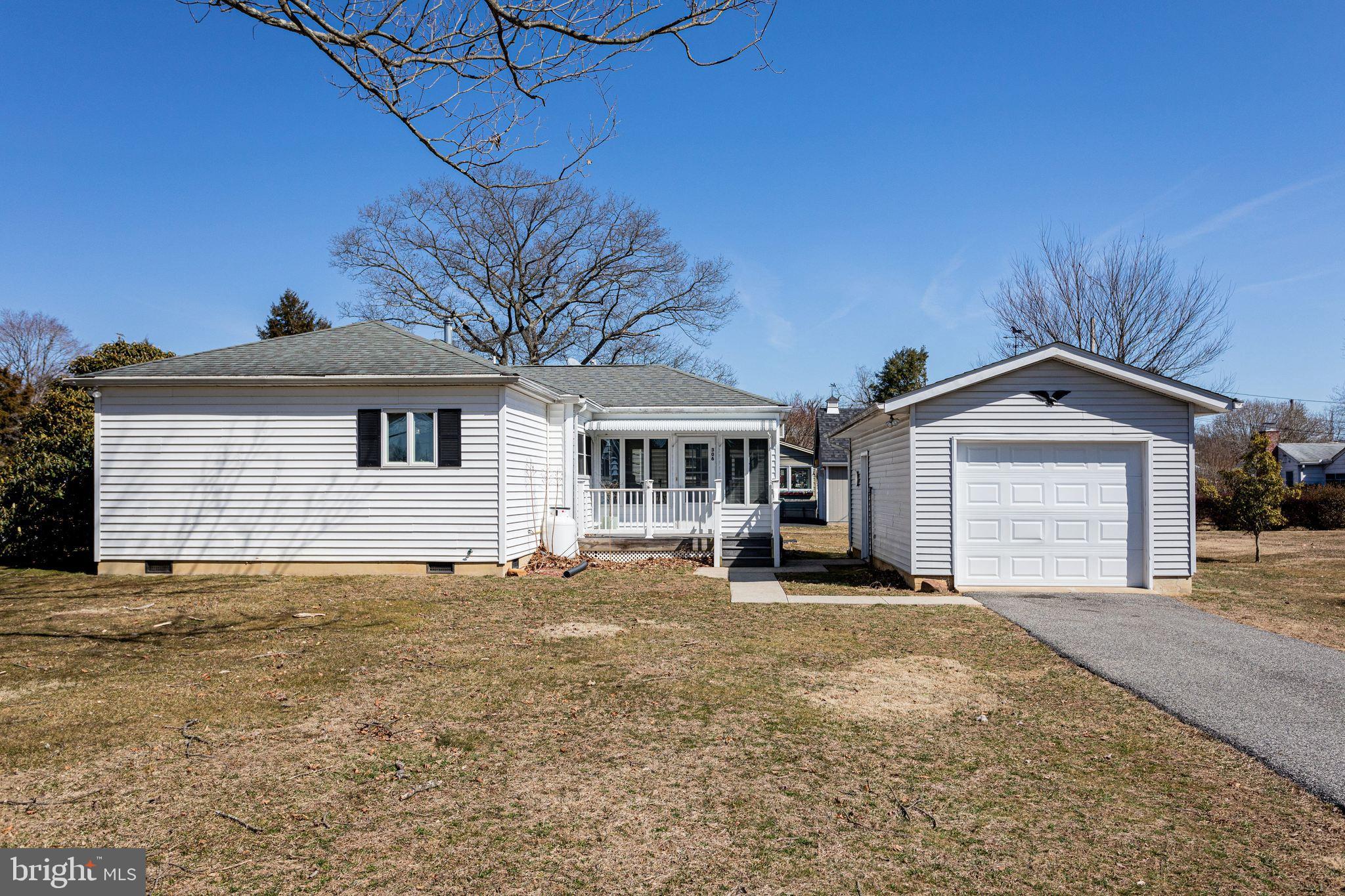 306 Hermitage Drive Elkton, MD 21921 - Photo 18 of 21 Side view of home, deck & driveway to garage