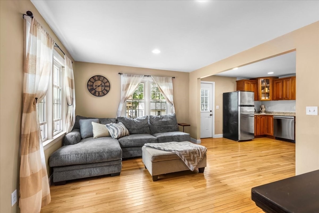 20 Cooks Lane Bellingham, MA 02019 - Photo 4 of 21 a living room with furniture and kitchen view