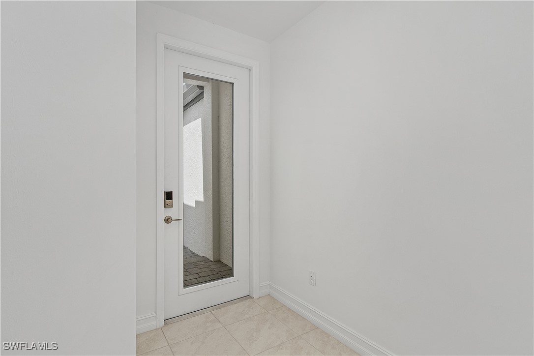 7498 Rockefeller Drive Naples, FL 34119 - Photo 3 of 22