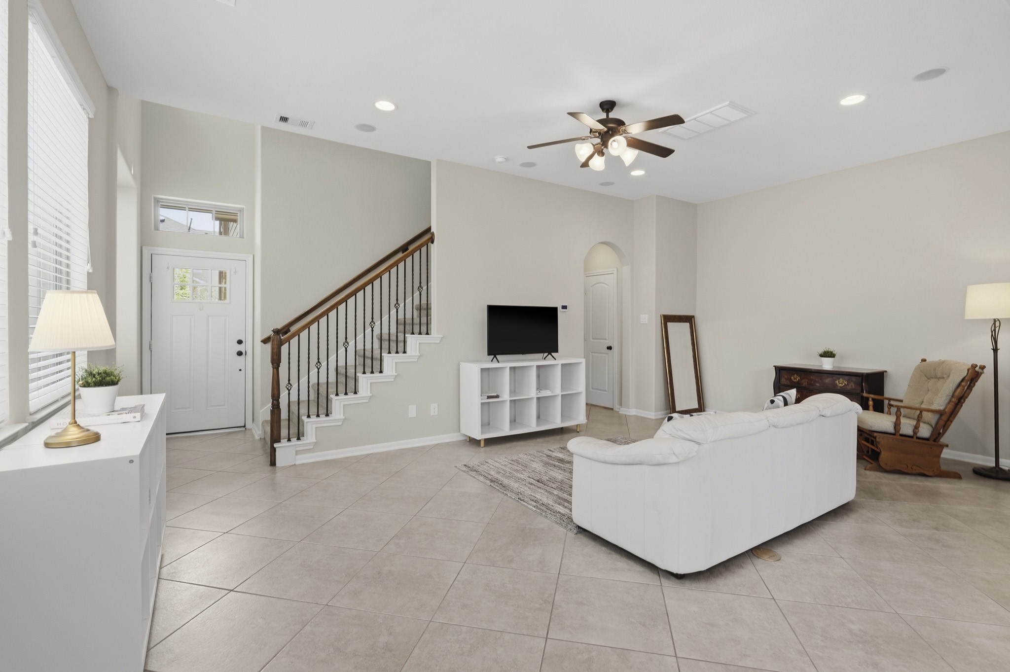 12115 San Luca Street Richmond, TX 77406 - Photo 18 of 44 With soaring ceilings, abundant recessed lighting, and versatile layout options, the great room provides plenty of space to relax, entertain, and make lasting memories.
