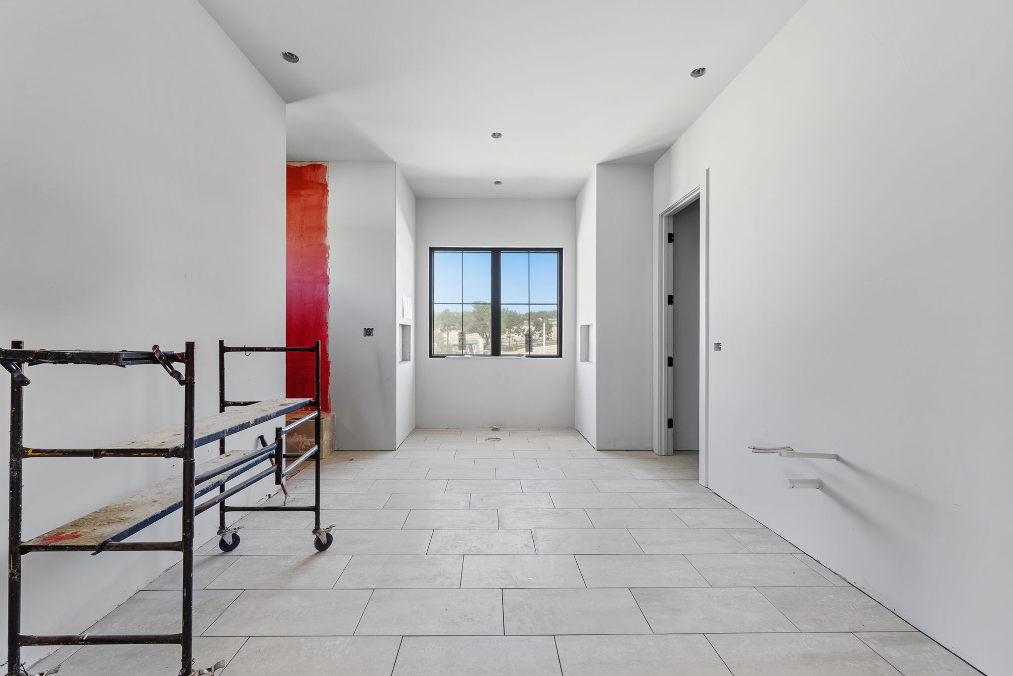 3300 Rm-165 Dripping Springs Dripping Springs, TX 78620 - Photo 21 of 25 a view of an empty room with a window