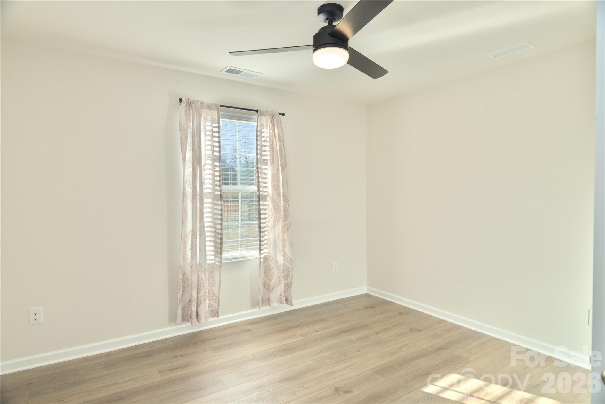 2154 Trollinger Drive Catawba, NC 28609 - Photo 13 of 33 a view of an empty room with a window