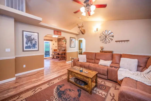 a room with furniture and a book shelf