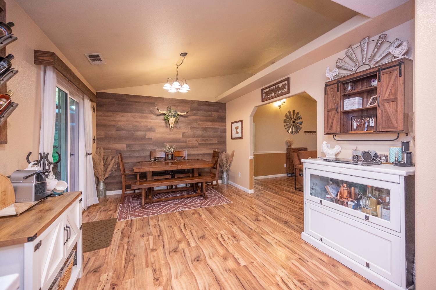 4568 Roadrunner Drive Ione, CA 95640 - Photo 30 of 56 a living room with furniture and a fireplace