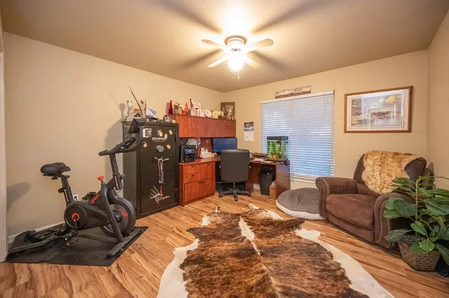 a patio with yard and outdoor seating