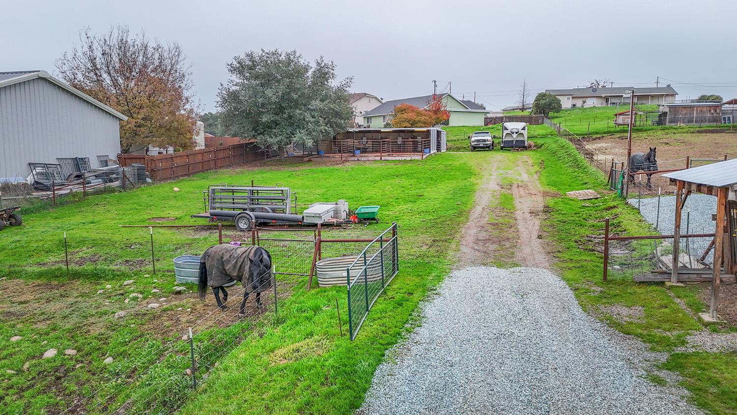 4568 Roadrunner Drive Ione, CA 95640 - Photo 8 of 56 a front view of a house with garden