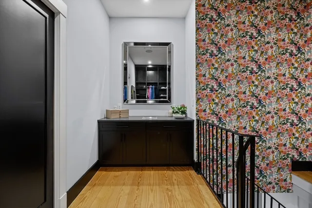 a bathroom with a sink and a mirror