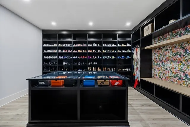 a room with wine cabinets