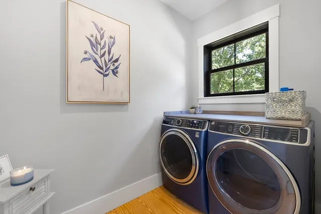 a view of a storage & utility room with washer and dryer