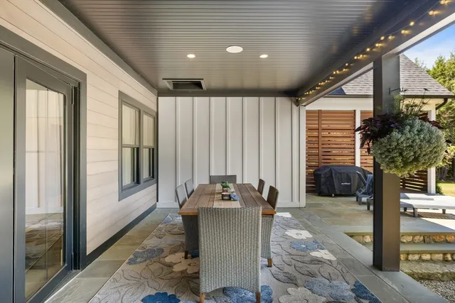 a front view of a house with a glass door