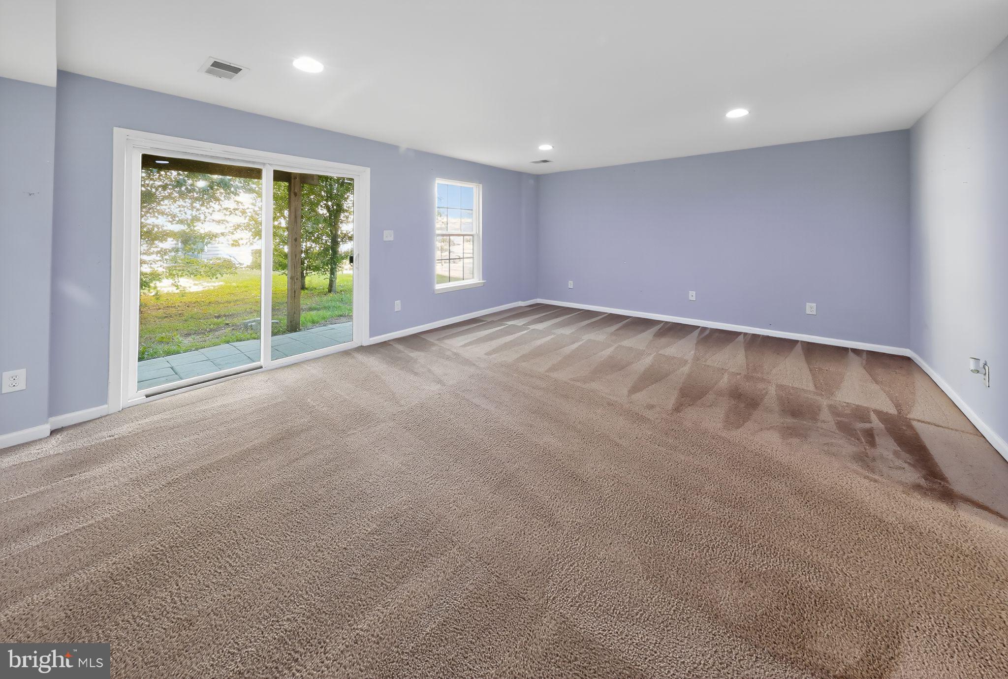 633 Barrie Road Middletown, DE 19709 - Photo 4 of 15 a view of an empty room with a window
