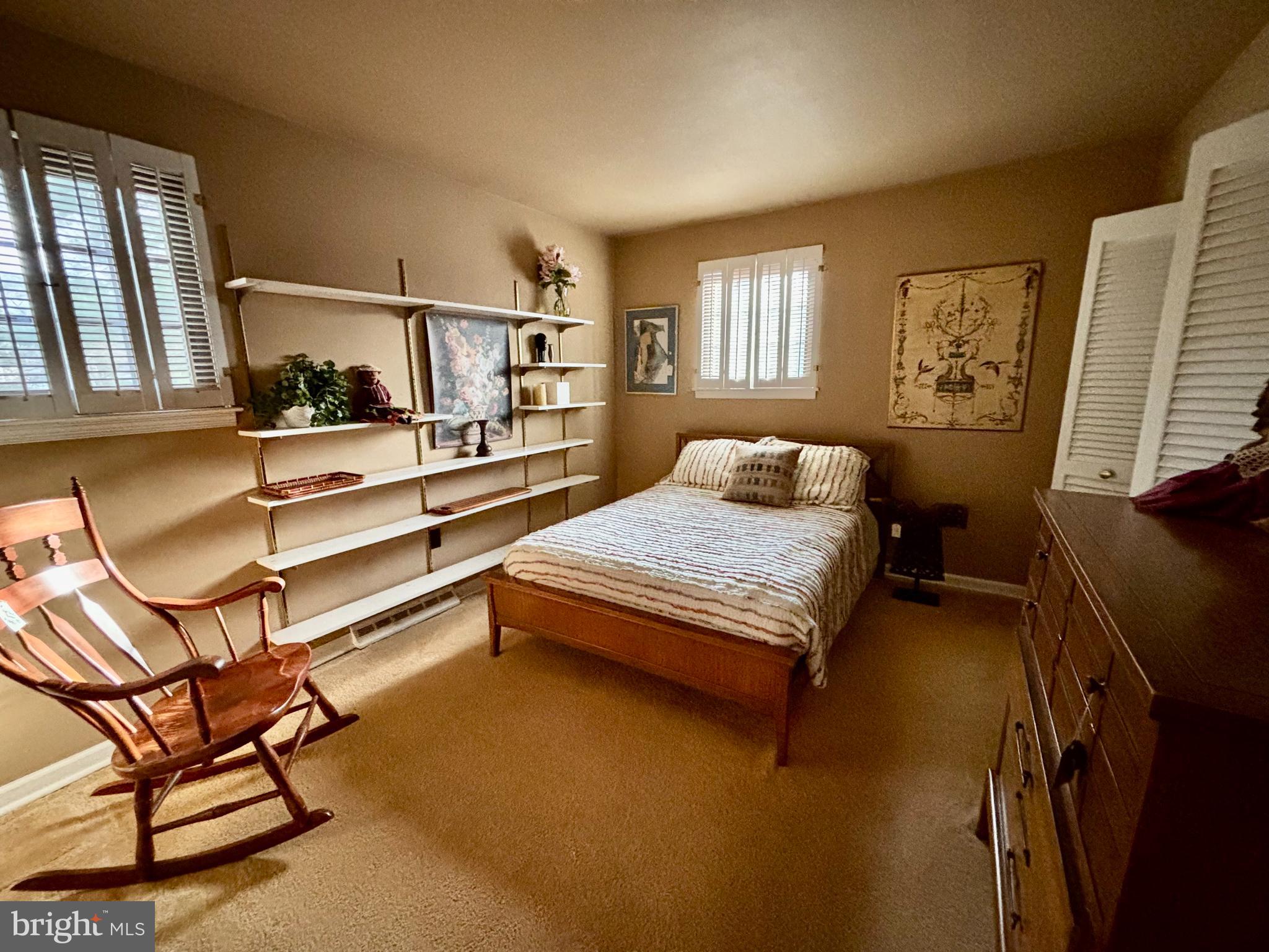511 Boundary Road Pitman, NJ 08071 - Photo 13 of 30 a bedroom with a bed chair and window