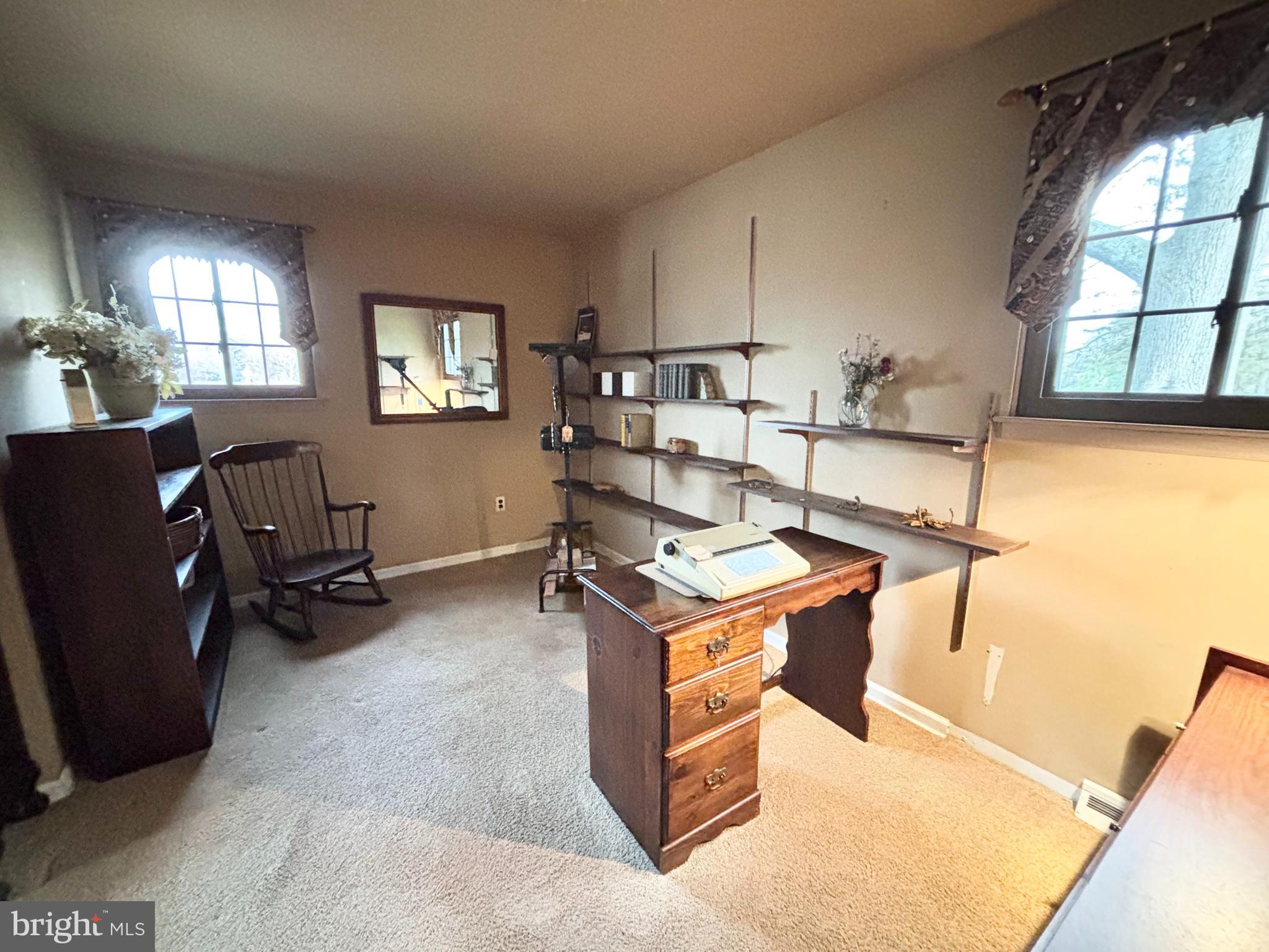 511 Boundary Road Pitman, NJ 08071 - Photo 17 of 30 a living room with stainless steel appliances kitchen island granite countertop furniture and a window