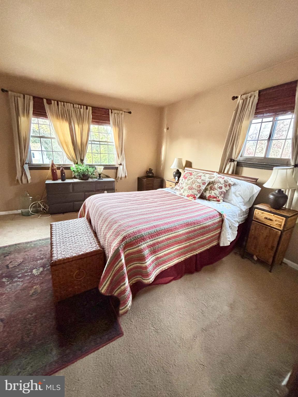 511 Boundary Road Pitman, NJ 08071 - Photo 18 of 30 a bedroom with a bed a table and chair