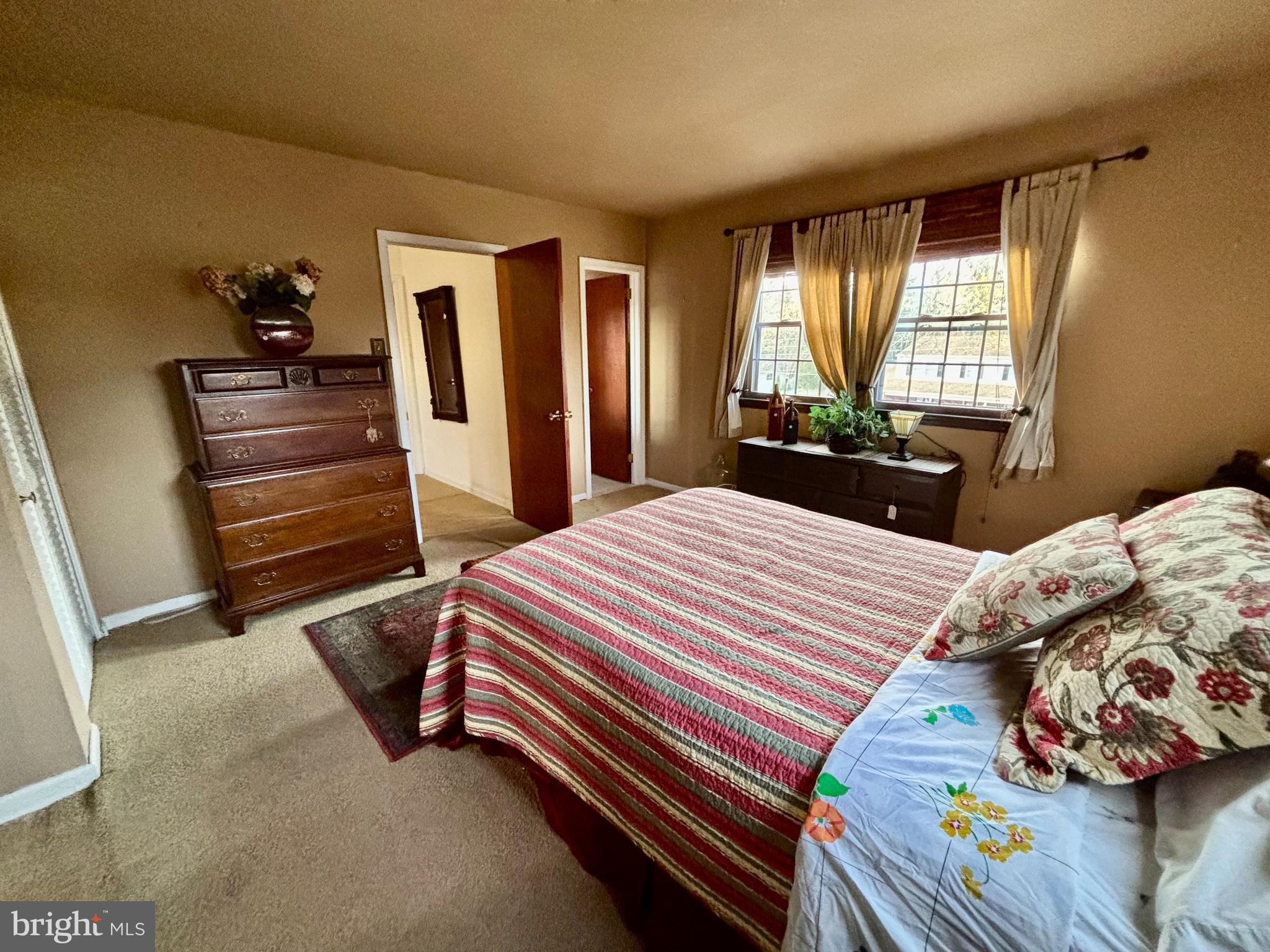 511 Boundary Road Pitman, NJ 08071 - Photo 19 of 30 a bedroom with a bed and a window