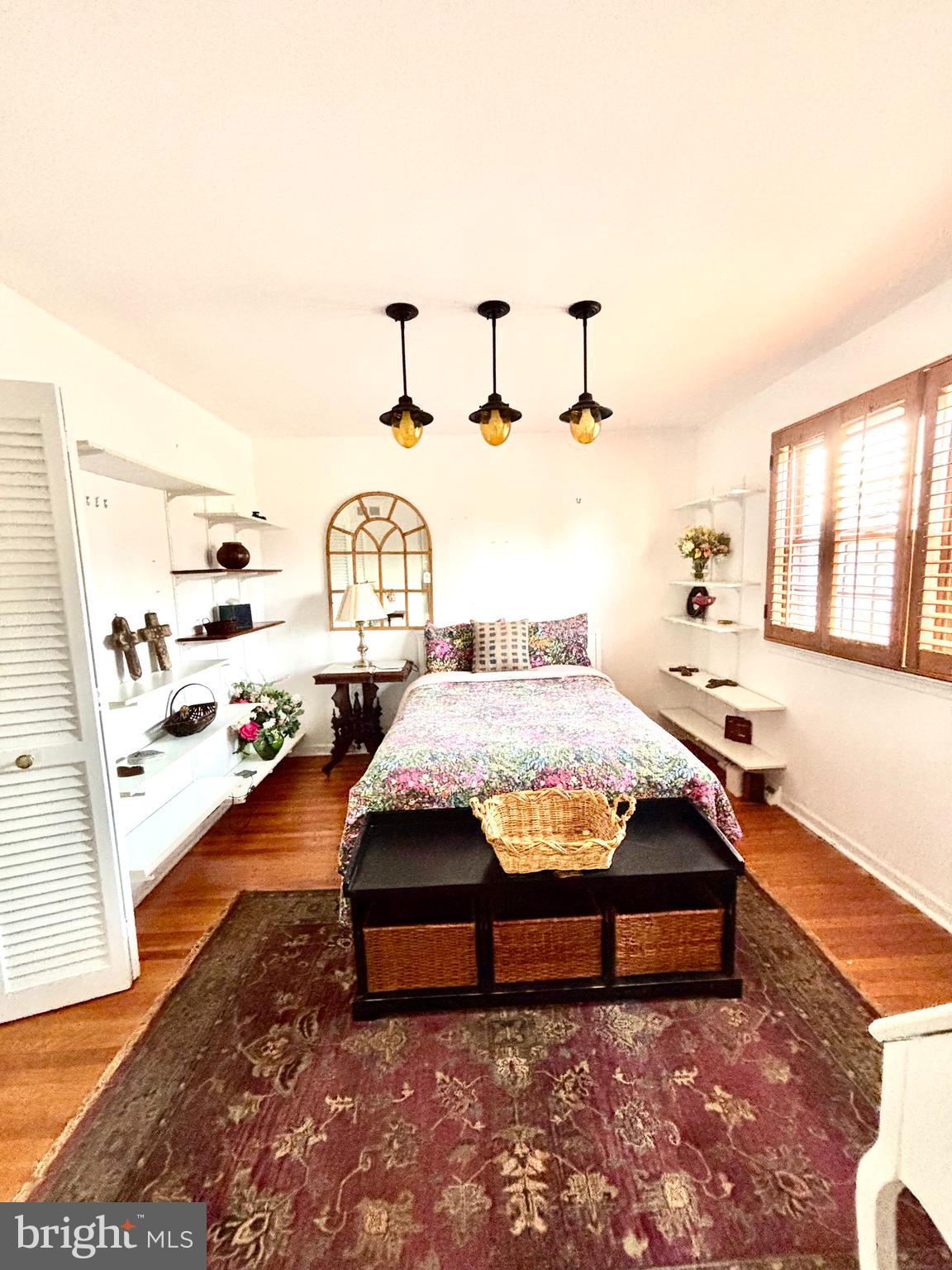 511 Boundary Road Pitman, NJ 08071 - Photo 22 of 30 a living room with furniture and a chandelier