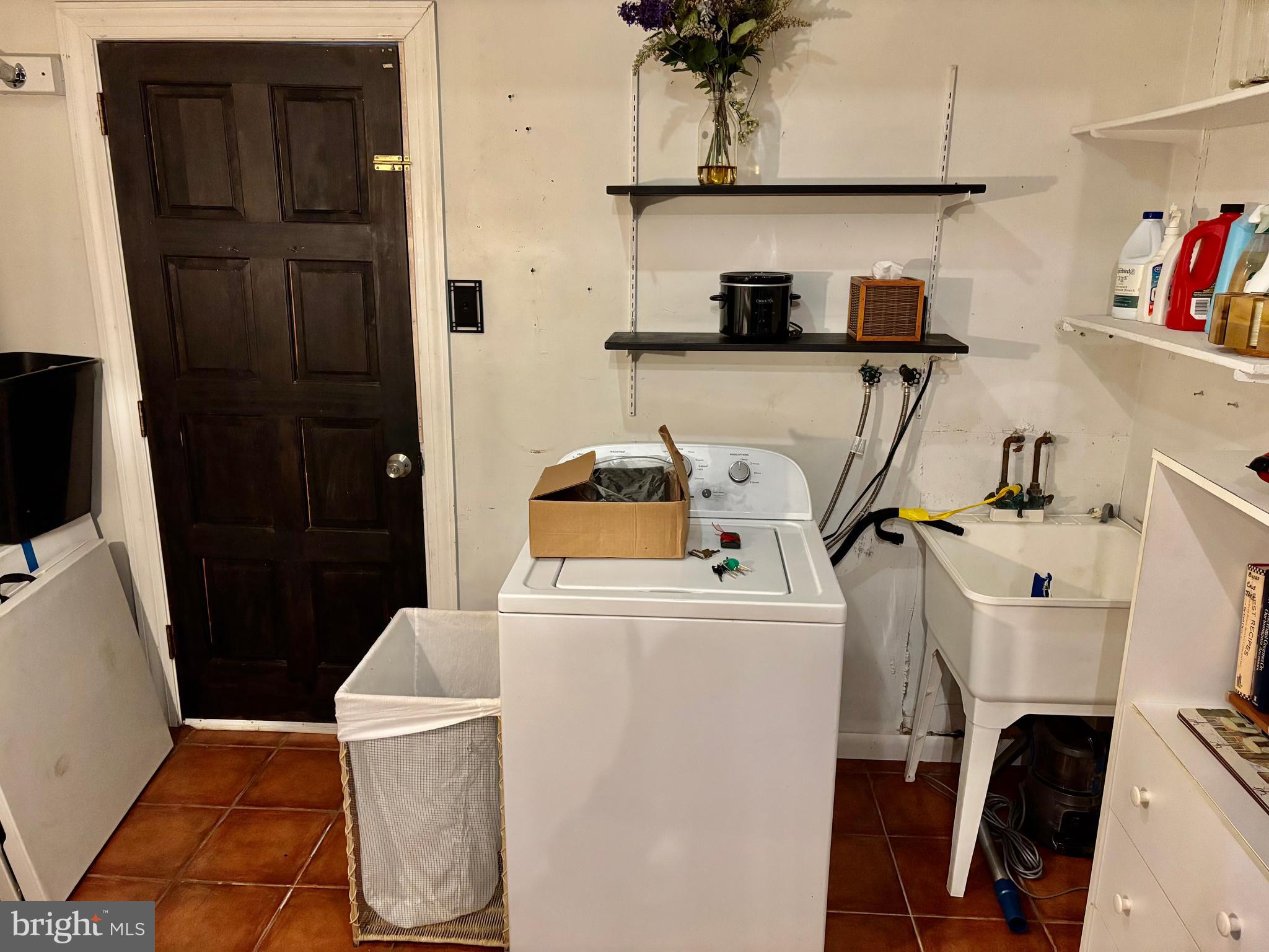 511 Boundary Road Pitman, NJ 08071 - Photo 30 of 30 a room with a refrigerator and cabinets