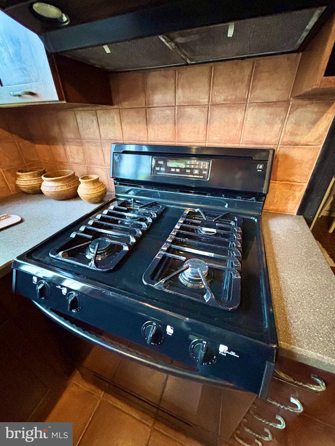 511 Boundary Road Pitman, NJ 08071 - Photo 7 of 30 a stove top oven sitting inside of a kitchen
