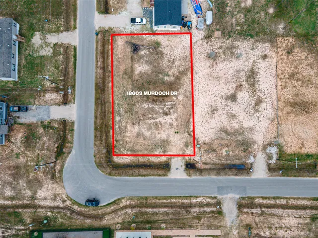 a view of a swimming pool with lounge chair