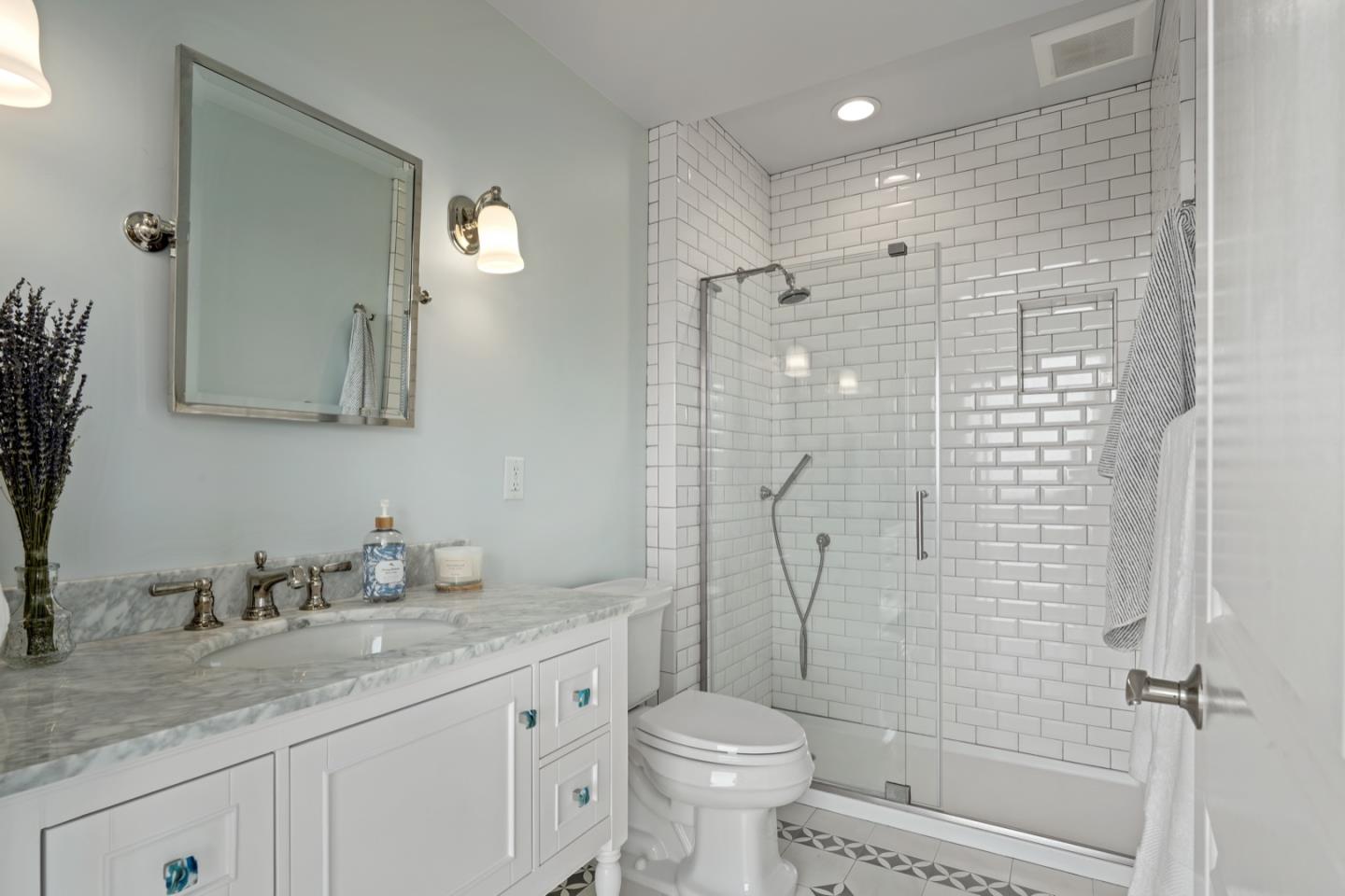 7440 Viewpoint Road Aptos, CA 95003 - Photo 15 of 39 a bathroom with a granite countertop sink toilet and shower