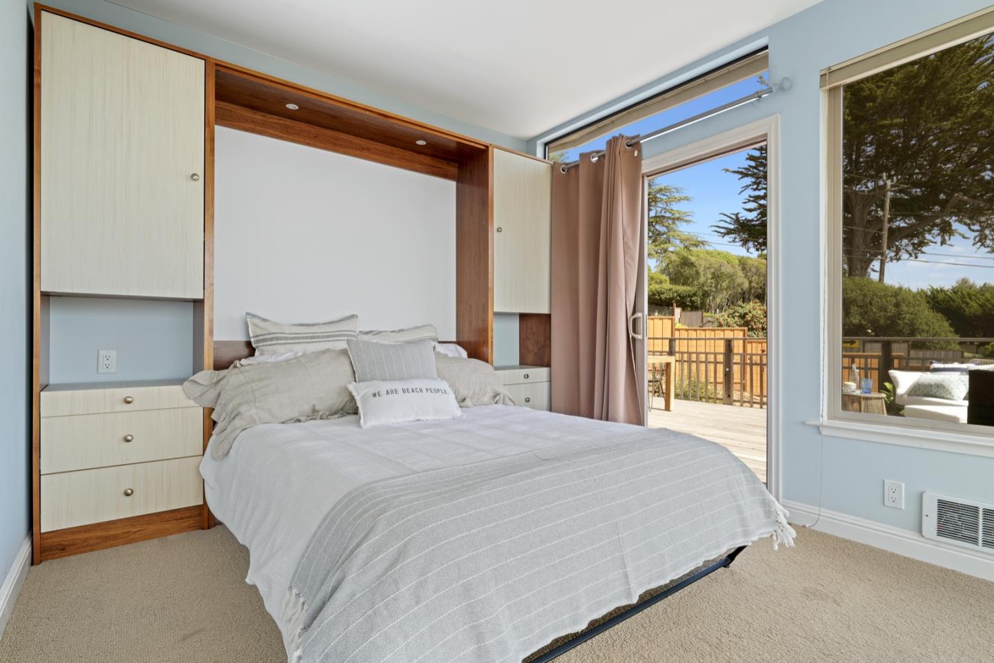 7440 Viewpoint Road Aptos, CA 95003 - Photo 16 of 39 a bedroom with a large bed and a window